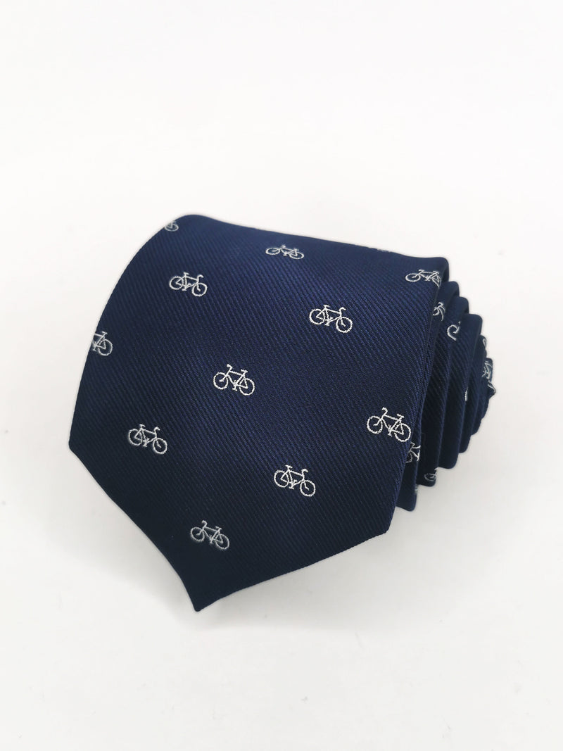 Corbata azul marino con bicicletas pequeñas blancas