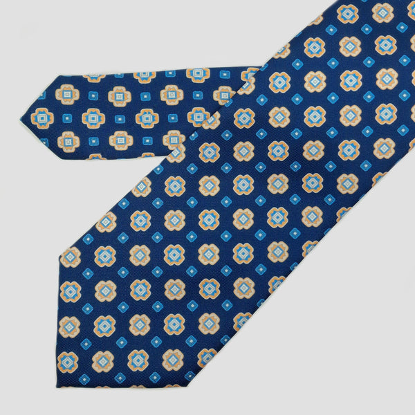 Corbata azul marino con flores geometricas mostazas y celestes - DiversoMen