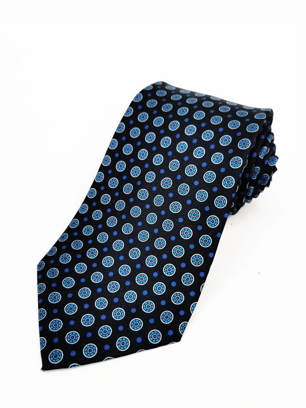 Corbata negra con círculos azules