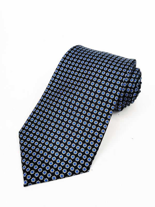 Corbata negra con pequeñas flores azules