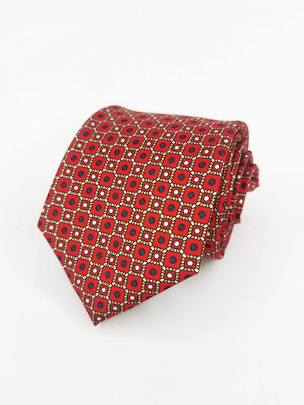 Corbata roja con cuadros y puntos azules